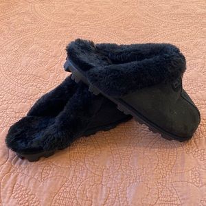 Size 11 Black House Slippers; hard sole.